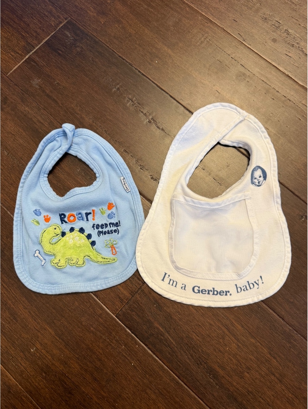 Set of 2 Gerber Baby Bibs - Blue Dinosaur Roar and White Gerber Baby Bibs